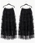 A black tiered tulle skirt with lace trim, shown from the front and back on black hangers against a white background.