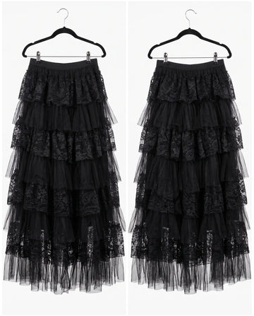 A black tiered tulle skirt with lace trim, shown from the front and back on black hangers against a white background.