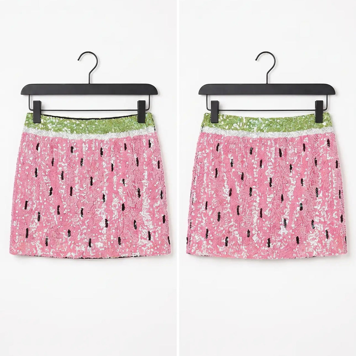 Two pink sequined mini skirts with a watermelon print pattern, hanging on black hangers against a white background.